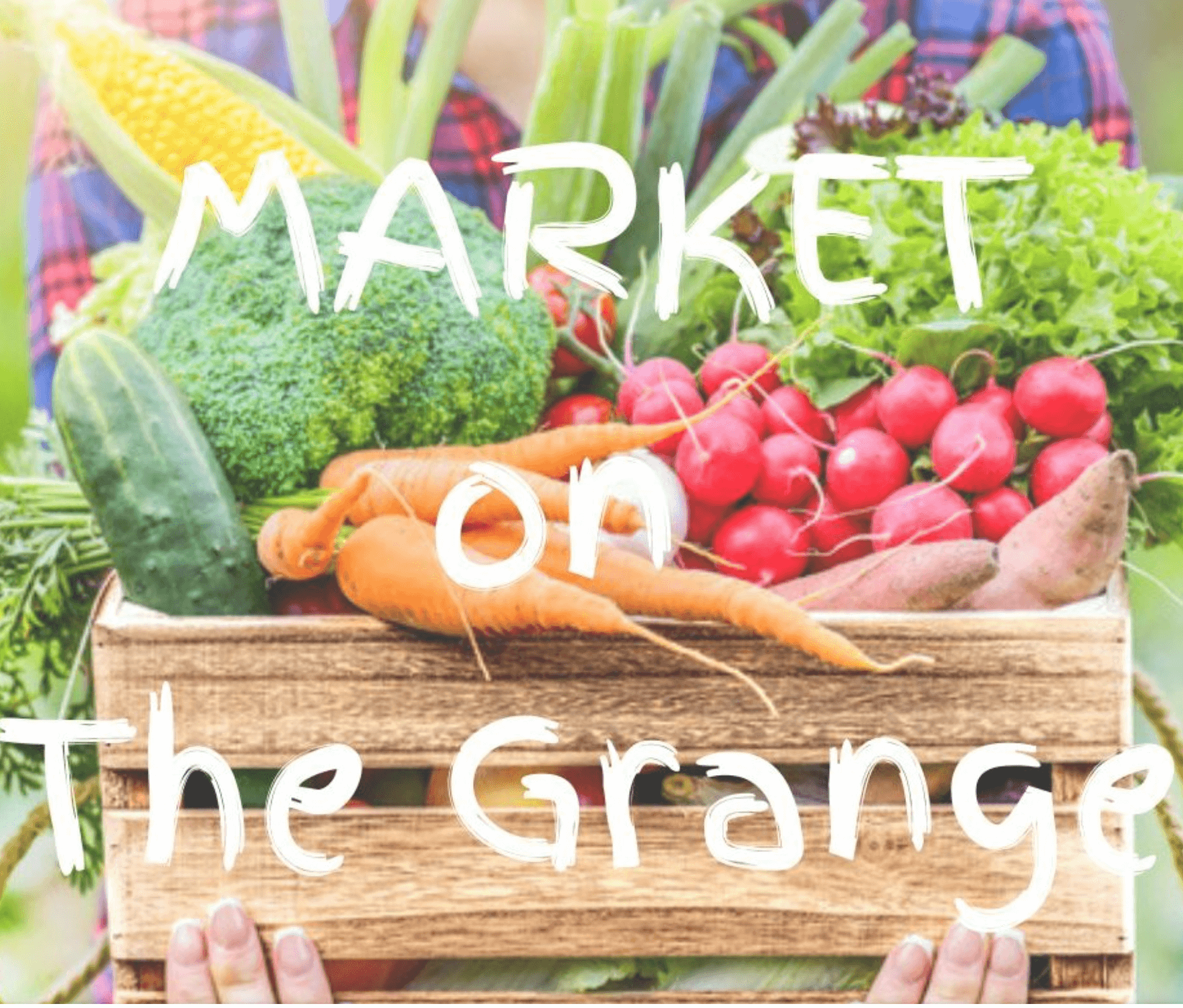 The words Market on The Grange over an image of a person holding a wooden box filled with carrots, cucumbers, radishes, sweet potatoes, broccoli, corn and lettuce.